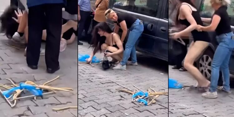 Şəhərin mərkəzində açıq-saçıq geynən qıza görə dava düşdü - VİDEO